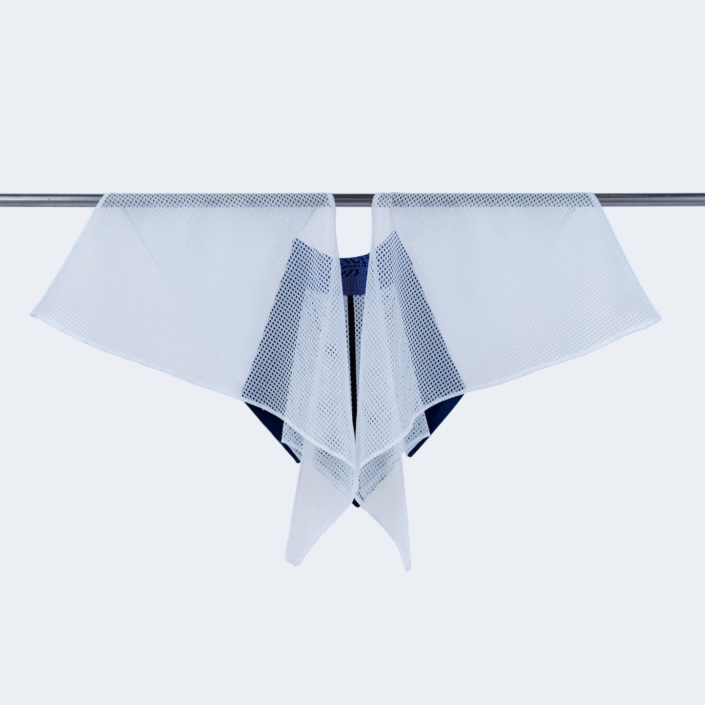 Back view showing sheer white mesh on hanger
