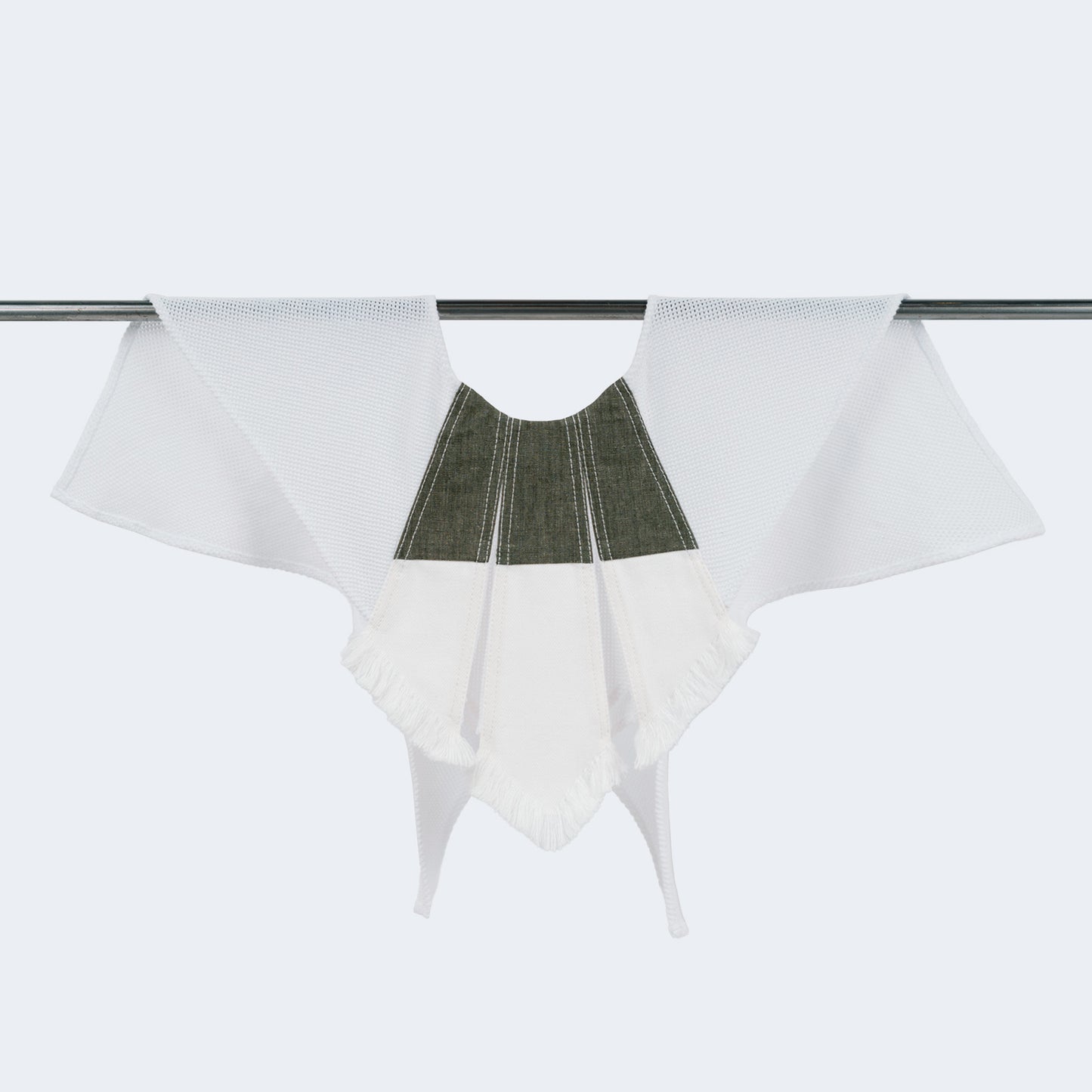 Front view of collar combining olive canvas, white denim, and mesh