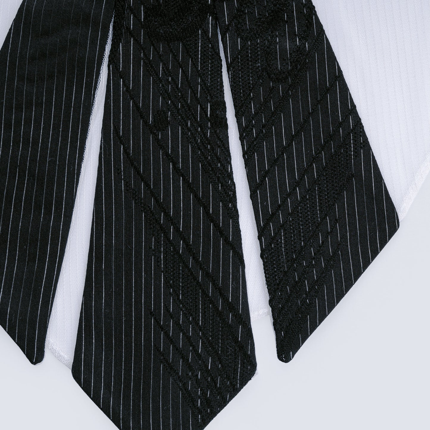 Close-up of striped Japanese silk and sheer mesh fabrics