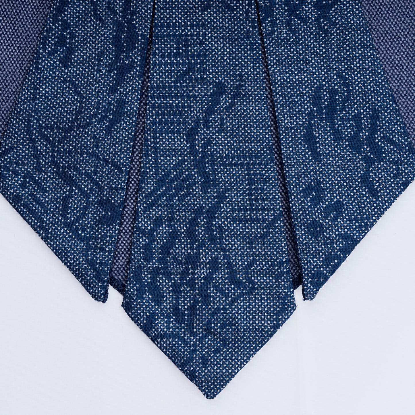 Close-up of Japanese blue silk collar with sheer blue mesh