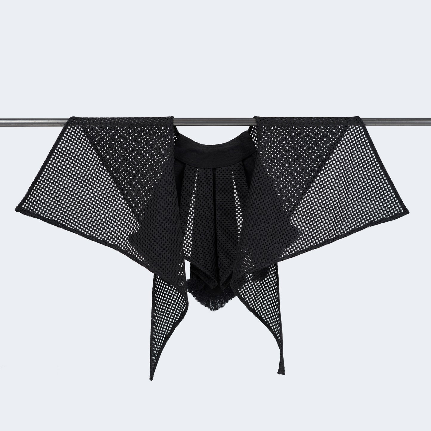 Back view showing sheer black mesh and clean finish