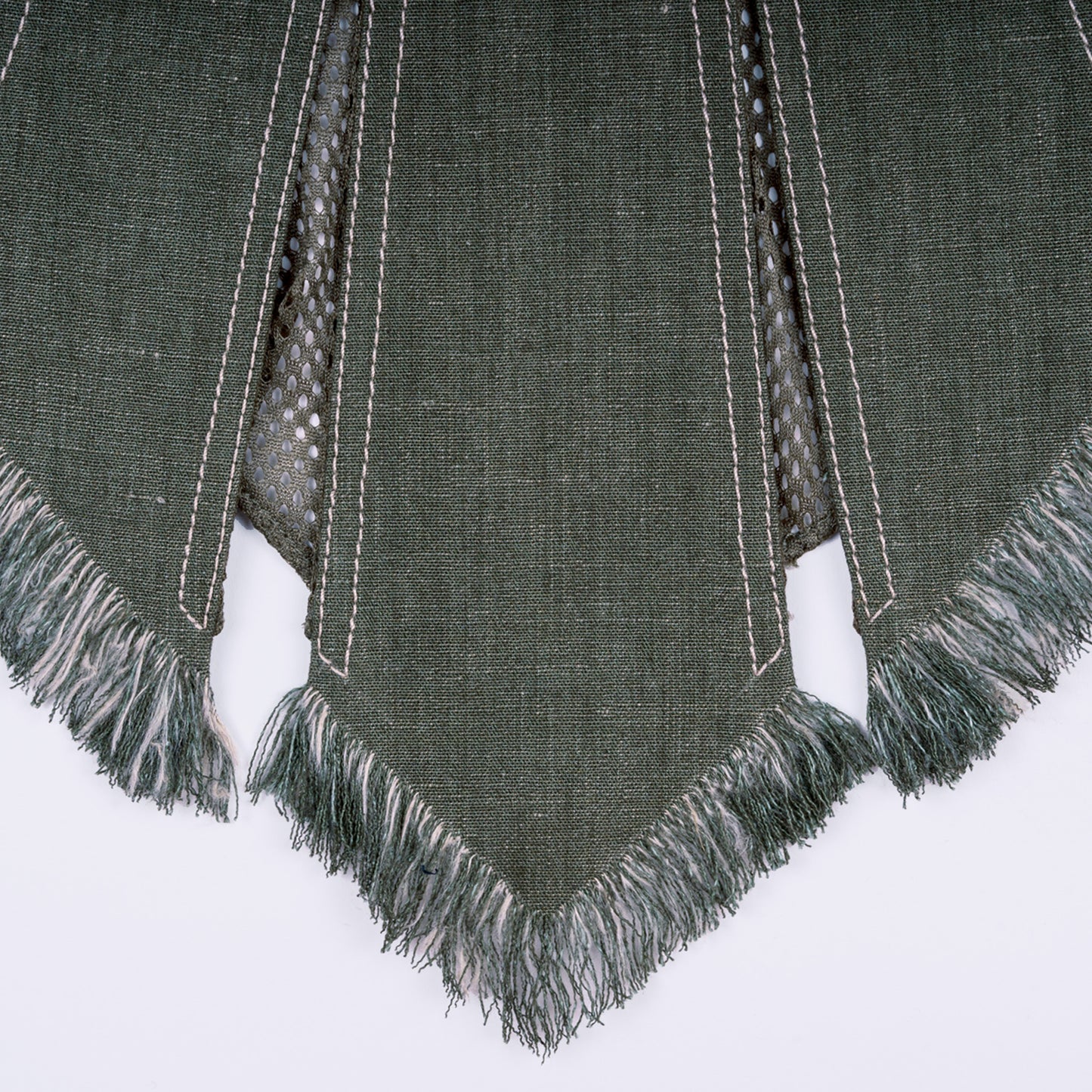 Close-up of olive green canvas and sheer mesh fabric