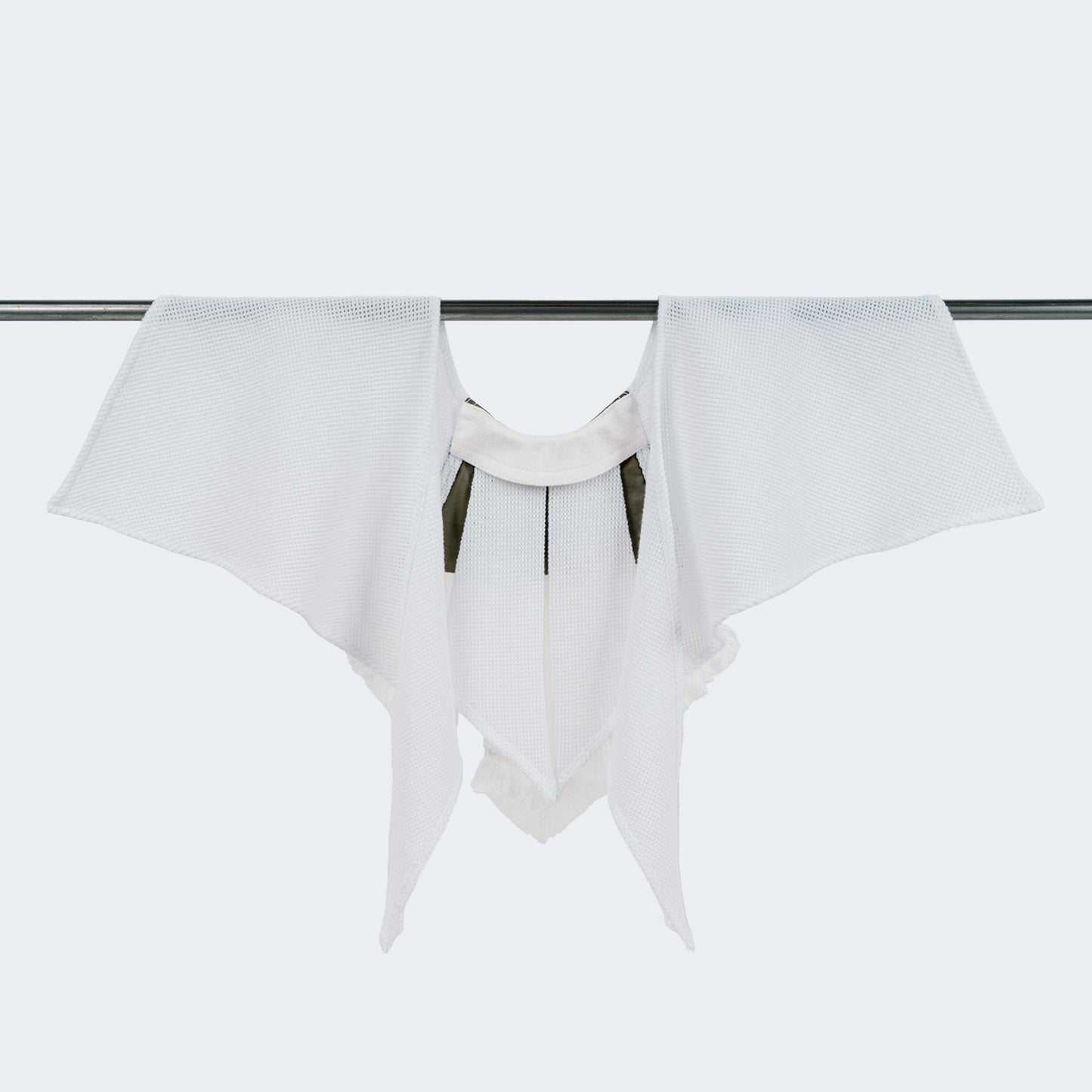 Back view of the collar showing layered cotton and mesh elements
