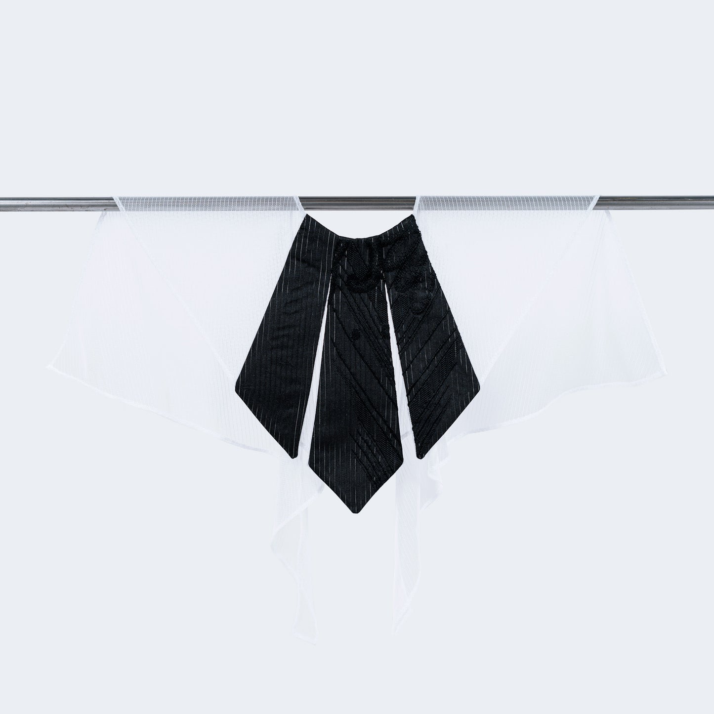 Front view of striped black silk and white mesh collar on hanger