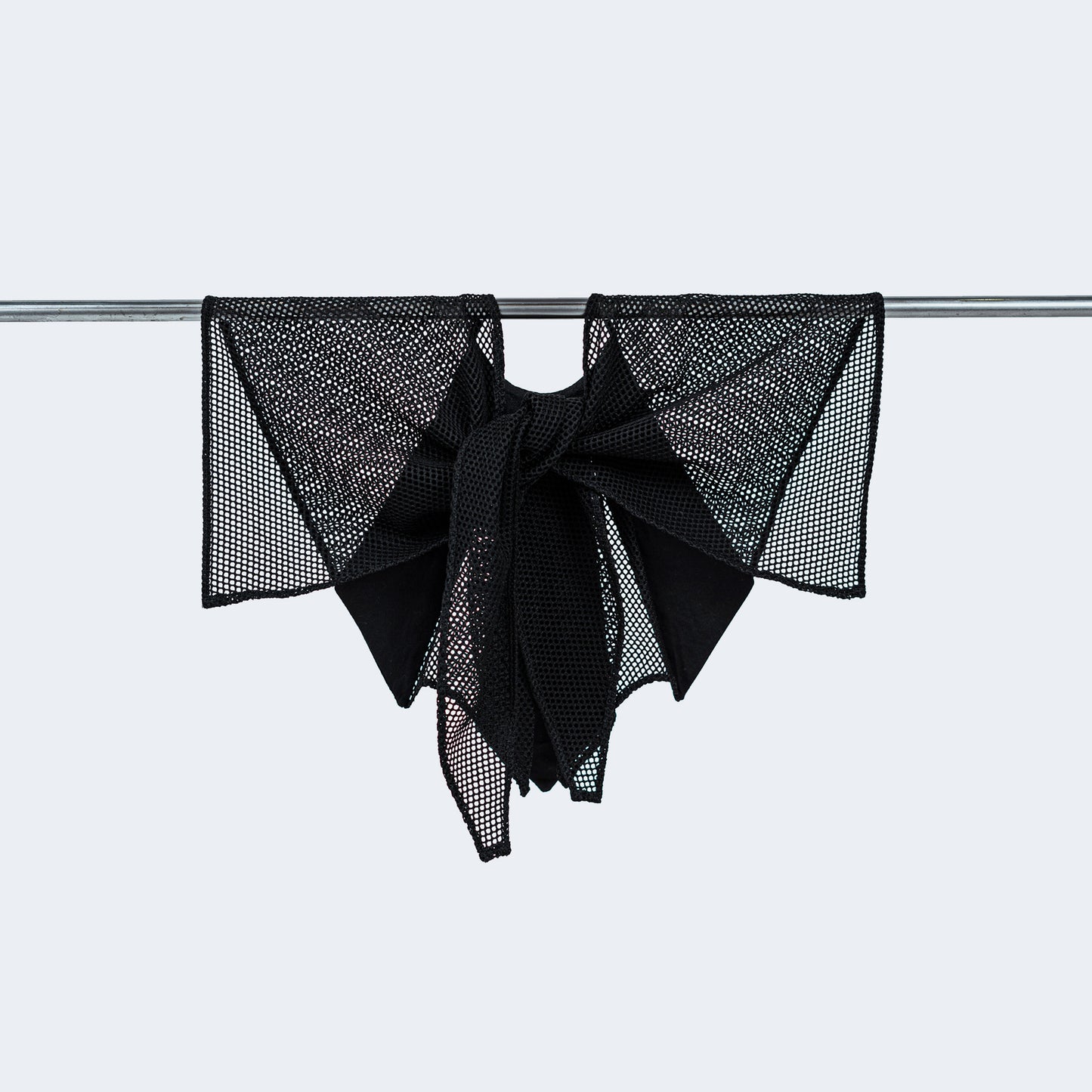 Back view of Japanese geometric black silk and sheer black mesh collar tied, displayed on hanger