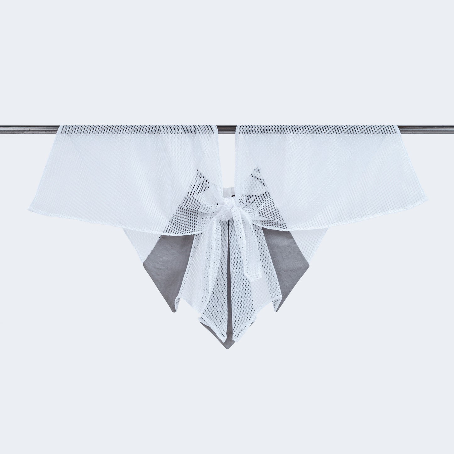 Back view of Japanese print and sheer white mesh collar tied, displayed on hanger