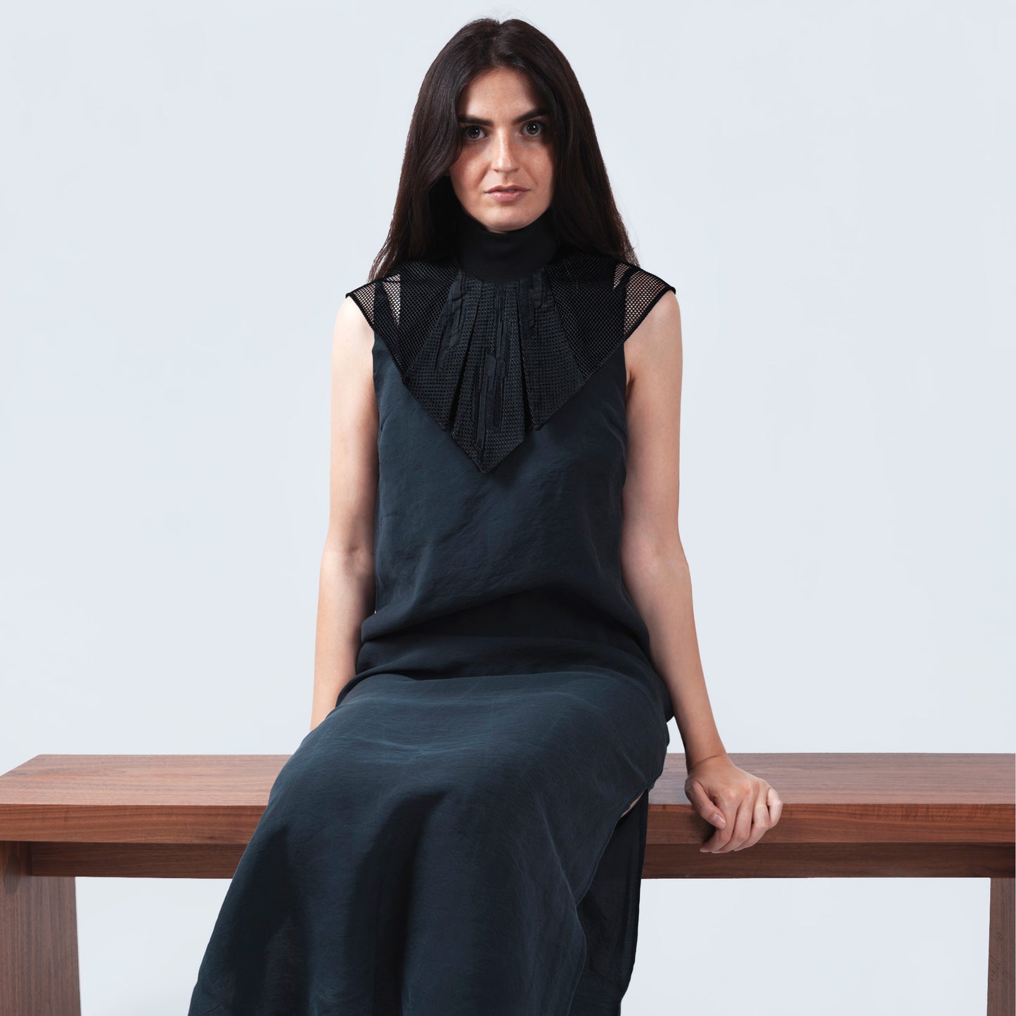 Model showcasing collar with Japanese geometric black silk and sheer black mesh