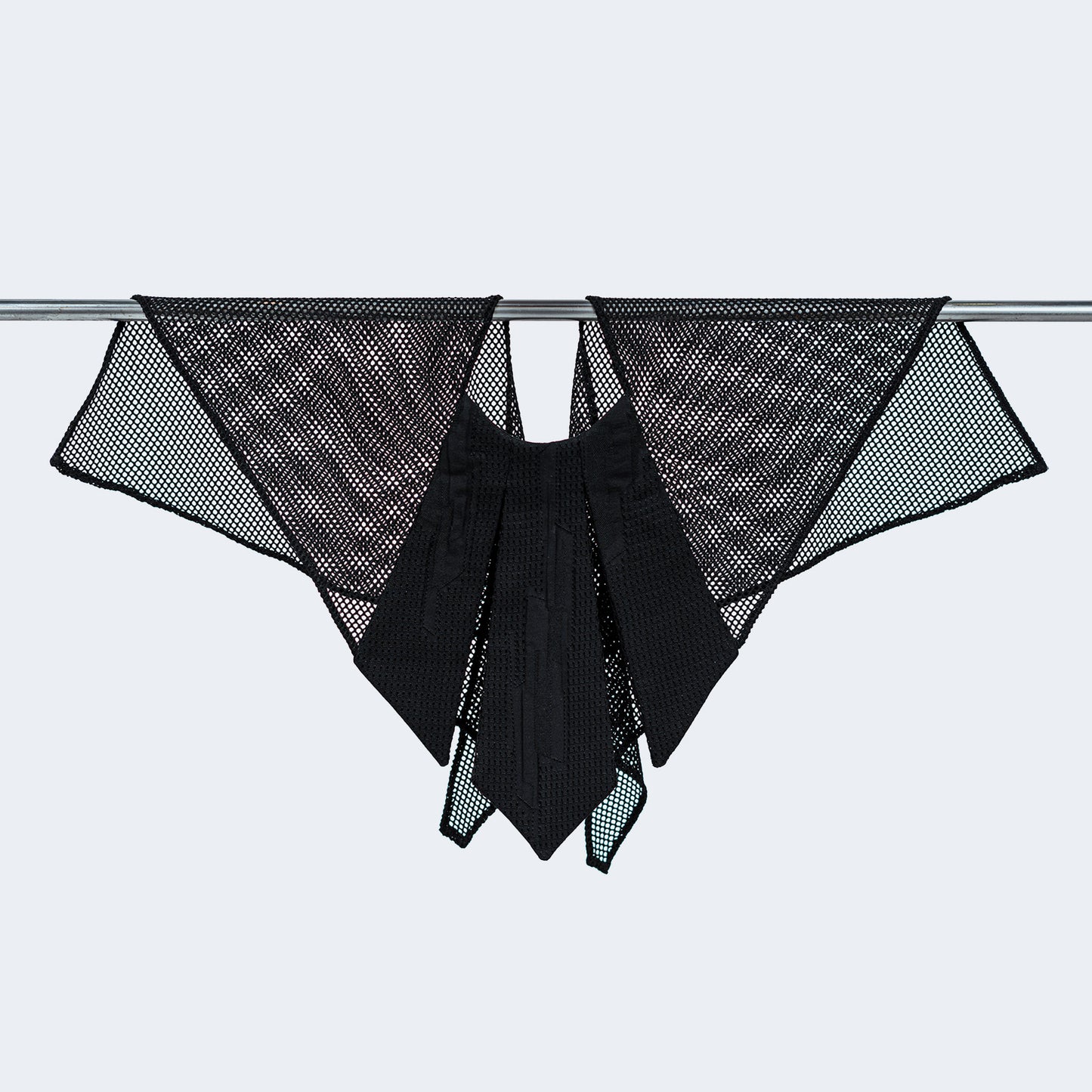 Front view of Japanese geometric black silk collar with sheer black mesh, displayed on hanger