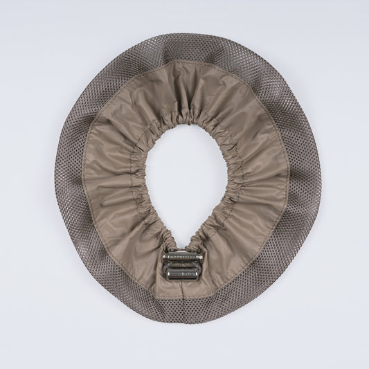 Adjustable khaki hair band displayed fully open from above, highlighting the blend of smooth nylon and mesh fabric.
