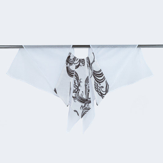 Front view of Japanese print collar with sheer white mesh, displayed on hanger