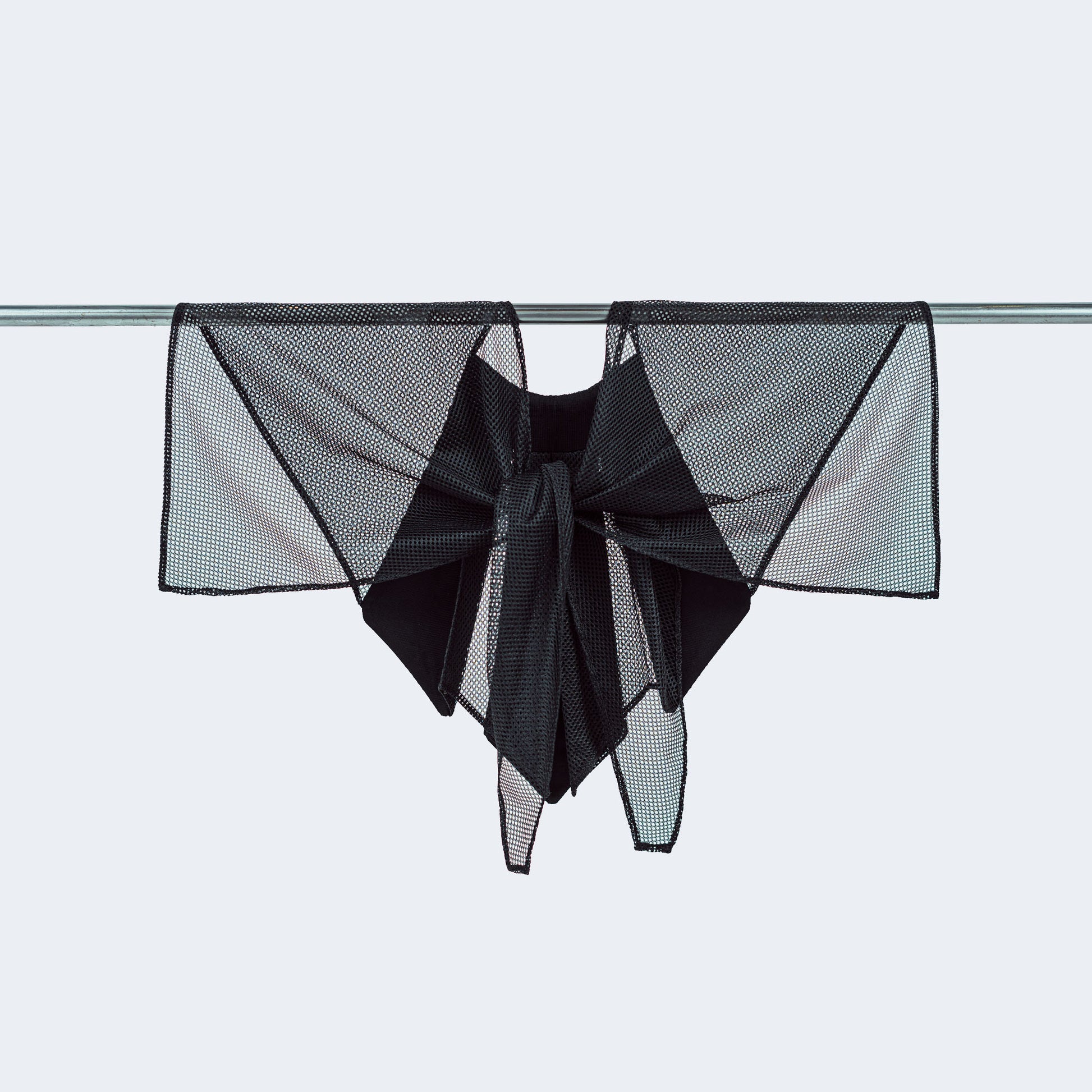 Back view of Japanese black silk and sheer black mesh collar tied, displayed on hanger