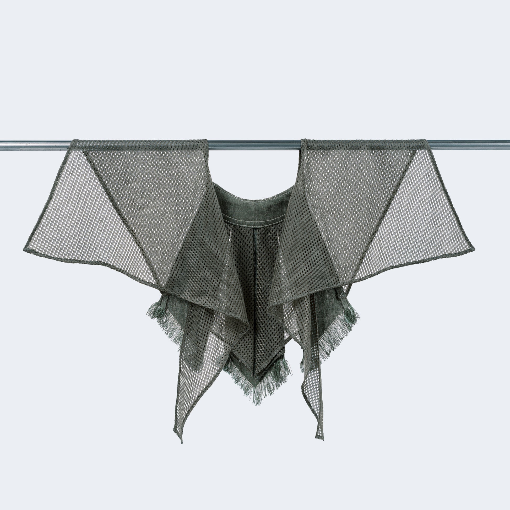 Back view showing sheer green mesh and canvas