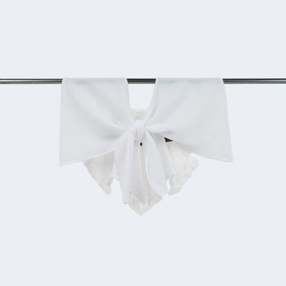 Tied collar showcasing olive canvas, white denim, and mesh blend