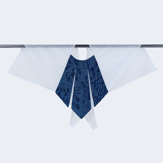 A dotted blue and white scarf with a unique collar design, displayed on a hanger.