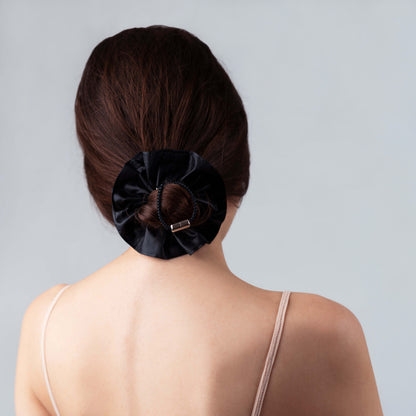 Model wearing the black ripstop nylon scrunchie, styled naturally to show durability, comfort, and elegance.
