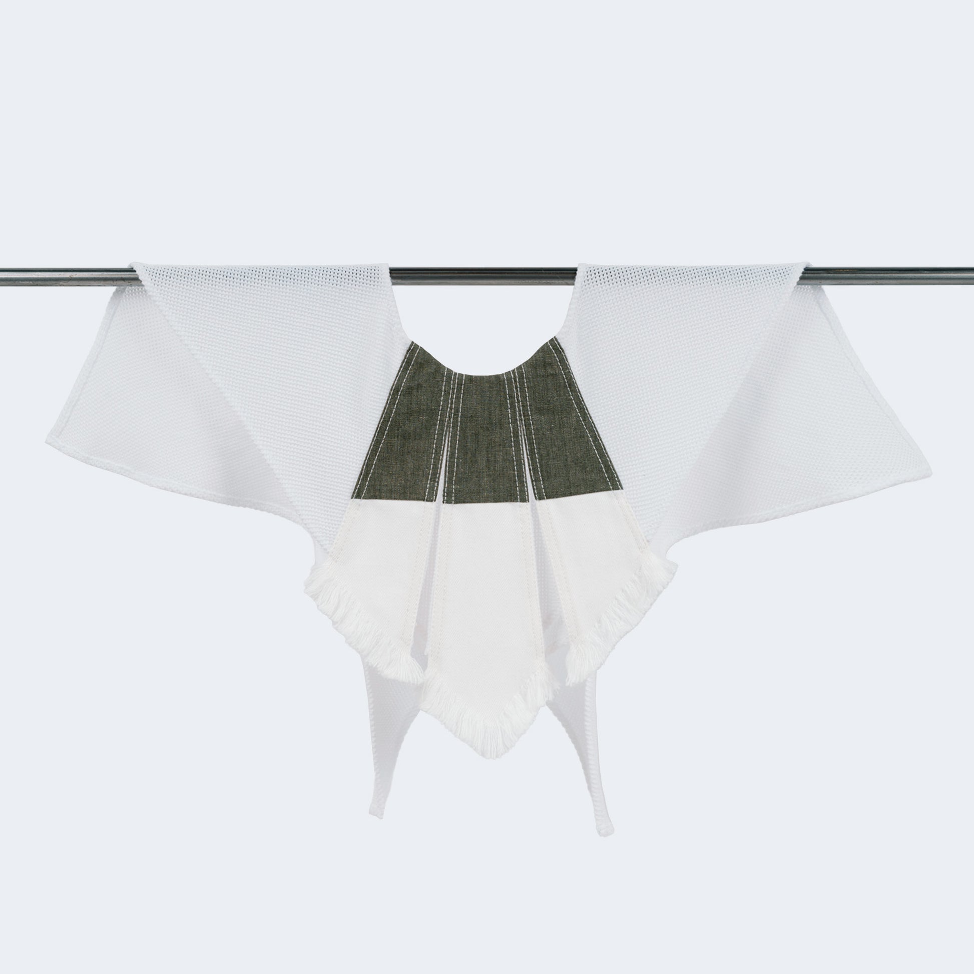 Front view of collar combining olive canvas, white denim, and mesh