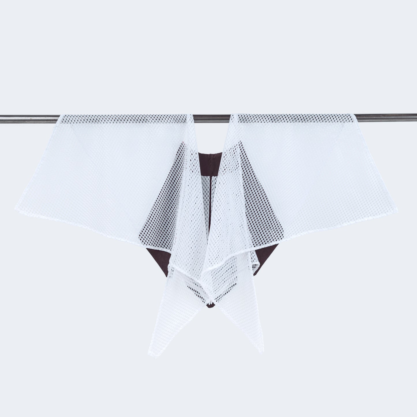Back view of floral print collar with sheer white mesh, displayed on hanger