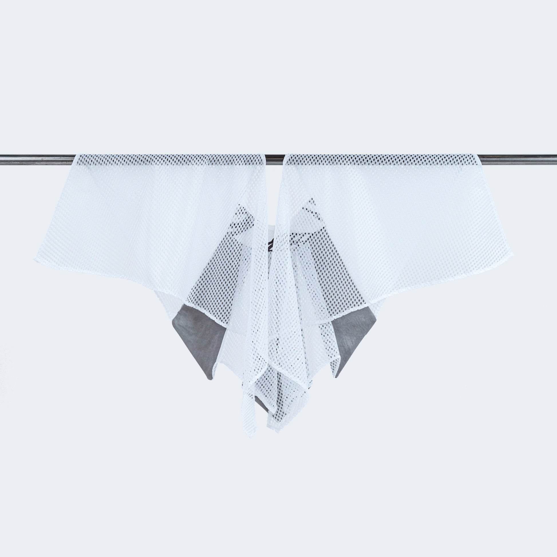 Back view of Japanese print collar with sheer white mesh, displayed on hanger