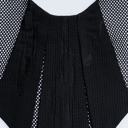 Close-up of Japanese geometric black silk collar with sheer black mesh