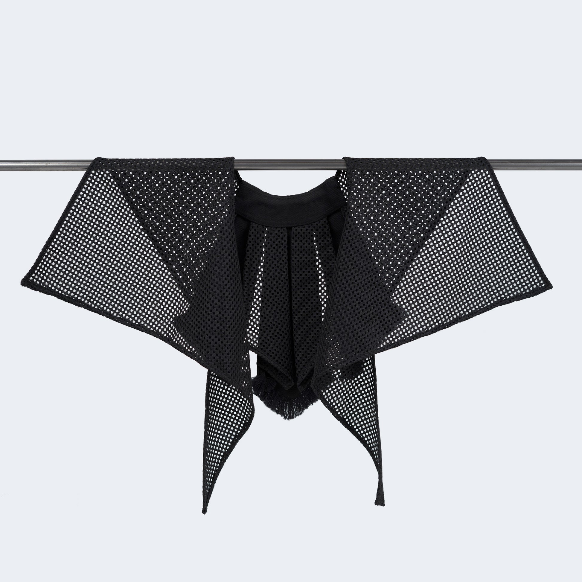 Back view showing sheer black mesh and clean finish