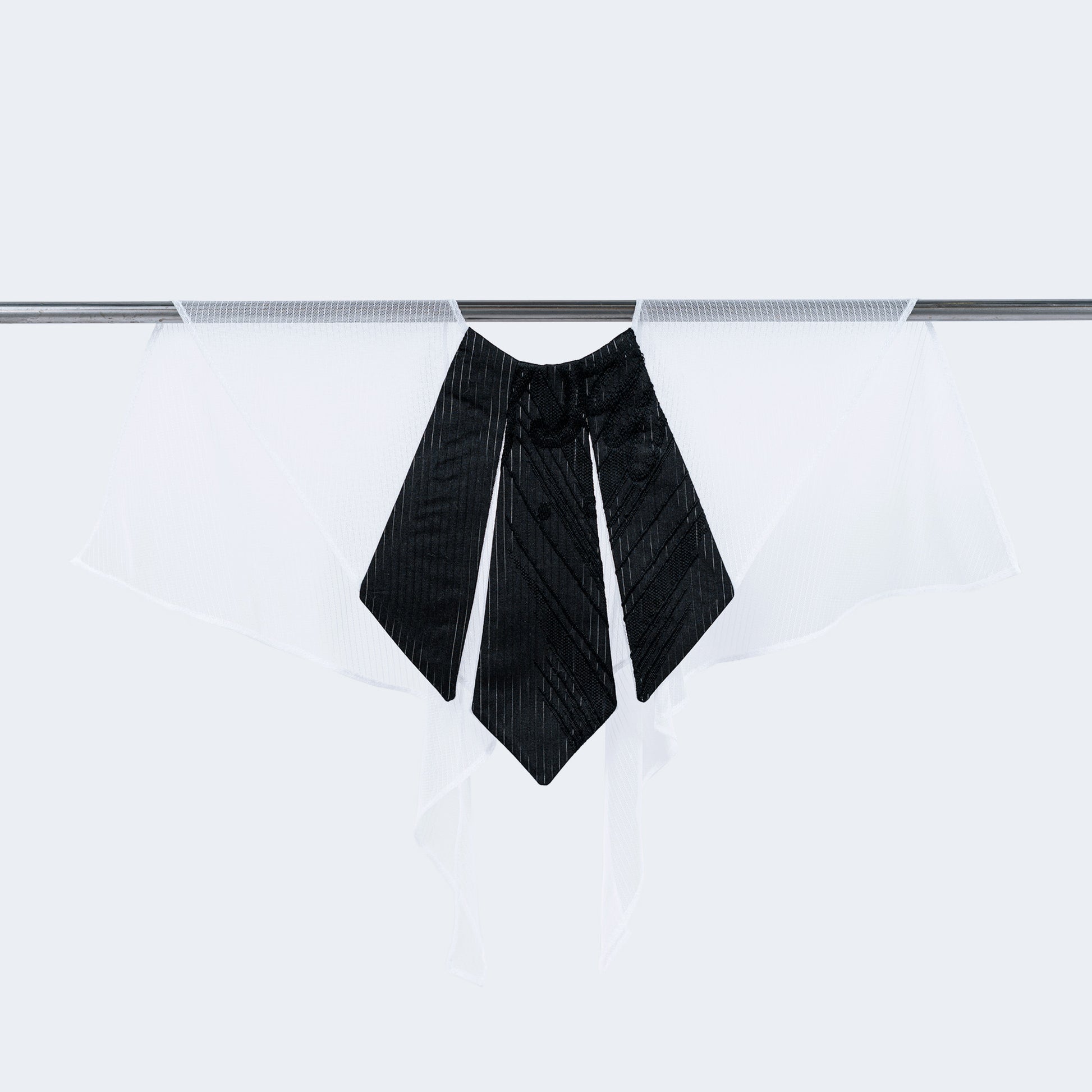 Front view of striped black silk and white mesh collar on hanger