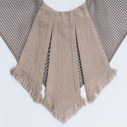 Close-up of sand-colored canvas and mesh fabric